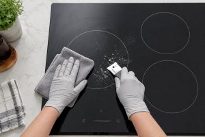 Safe owner-level cooktop care and inspection scene
