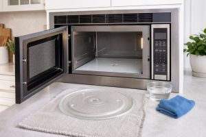 Safe owner-level microwave care and inspection scene