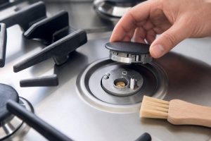 Safe owner-level rangetop care and inspection scene