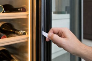 Safe owner-level wine refrigeration care and inspection scene